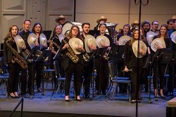 The HSU Concert Band closes a performance with song.